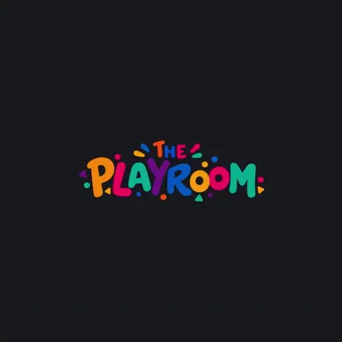 The Playroom logo forming out of colourful particles