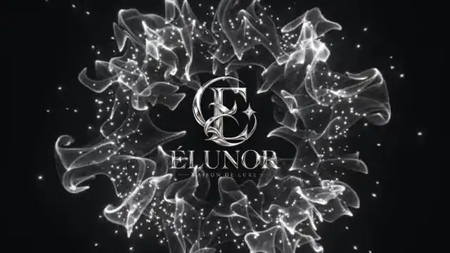 Silver Wisps luxury intro with white wisps curling into a ring around the logo